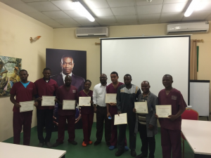 The hospital's technicians proudly present their UAM certificates following a training.